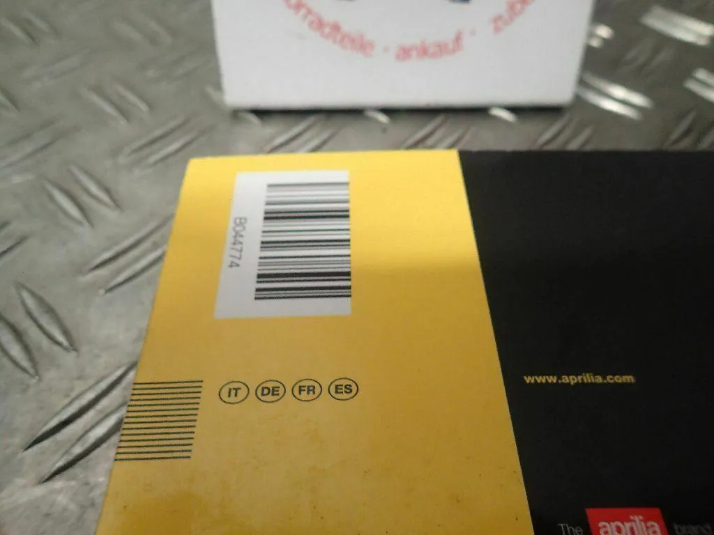 Bedienungsanleitung IT, DE, FR, ES Fahrerhandbuch Aprilia Tuono V4 Factory EZ.13